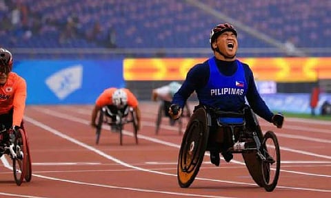 FLAG BEARER. Wheelchair racer Jerrold Pete Mangliwan during the 2024 Paralympic Games in Paris, France. He will lead Team Philippines in the ASEAN Para Games opening ceremony parade of nations on Jan. 20, 2026 in Nakhon Ratchasima, Thailand. (Contributed photo)