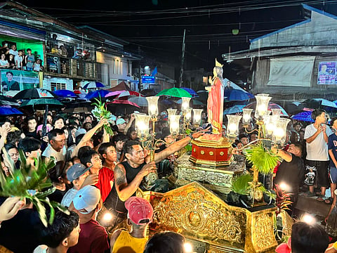 Devotees dance while shouting “Viva Apung Lucia! Pwera sakit!” around the carroza of Apung Lucia during the Kawakasan Kuraldal in Sasmuan, Pampanga.
Photo by Tristan Jingco