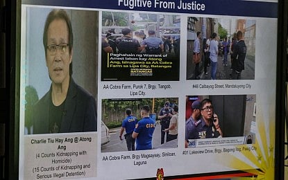 MOST WANTED. A video showing government efforts to locate businessman Charlie "Atong" Ang is presented during a press conference in Quezon City on Thursday (Jan. 15, 2026). The Philippine National Police on Friday (Jan. 16) warned the public, including Ang's friends and associates, against providing him shelter and assistance, and sharing false information that could obstruct the ongoing manhunt operations. (PNA photo by Lloyd Caliwan)