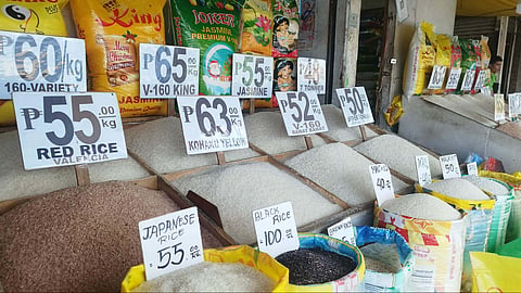 Sacks of rice with price tags are displayed at a stall inside Agdao Public Market in Davao City January 19, 2026. Prices of both imported and local rice varieties remained elevated following the holiday season, reflecting steady demand and higher costs that continue to weigh on household budgets.