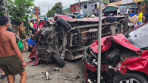 A passenger multicab overturned after being hit by a sedan around 9 a.m. Monday, March 9, 2026, in Barangay Tuyan, Naga City, Cebu, leaving 16 people injured.
Police said the multicab, which was loading passengers for its Naga–Basak route, was suddenly struck by a sedan, causing the vehicle to flip over and trap several passengers who were waiting for a ride. |