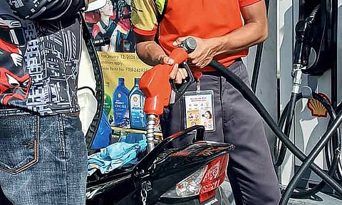 ADVANCE REFUELING. A rider refueled his motorcycle at a gasoline station along Quimpo Boulevard in Davao City on Sunday morning, March 8, 2026. Motorists in Davao City continue to feel the impact of recent fuel price increases as they brace for the adjustments implemented by oil companies earlier this week. Some motorists did not wait for the implementation, lining up at nearby gas stations.