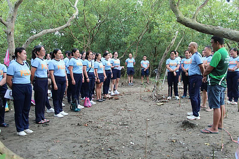 ILOILO. Police personnel and community partners plant mangroves during the launch of Project Tatap (Tulong, Aksyon, at Pagkakaisa para sa Kalikasan) led by Police Colonel Wilbert B. Parilla, officer-in-charge of the Iloilo City Police Office, on the morning of March 13, 2026, in Barangay Hinactacan, La Paz District, Iloilo City as part of environmental protection and sustainability initiatives.
