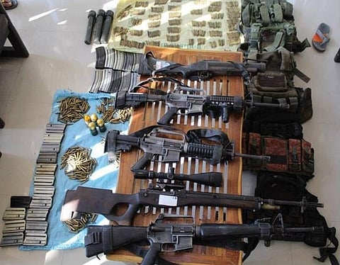 ZAMBOANGA. Military troops seize five high-powered firearms and other war materiel during a security patrol Friday, March 20, in Gadungan village, Talitay, Maguindanao del Norte.