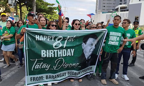 Supporters of the Duterte family joined the Solidarity Walk for former President Rodrigo Duterte on Saturday afternoon, March 28, 2026, along Roxas Avenue in Davao City, celebrating his 81st birthday. Dressed predominantly in green, participants marched from Roxas Avenue to San Pedro Square in a show of support and solidarity.