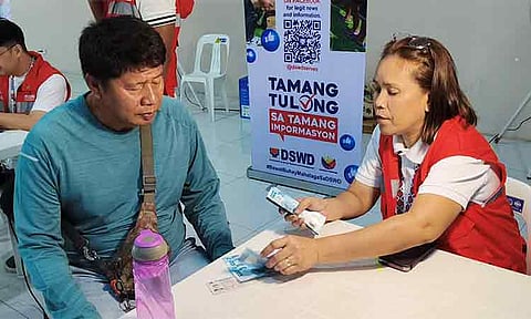 FUEL SUBSIDY. A tricycle driver who was included in the masterlist received a ₱5,000 fuel subsidy during the payout at Agdao Public Market in Davao City on Wednesday morning, April 8, 2026. Some beneficiaries expressed gratitude for the assistance, saying it will help cover their daily expenses amid rising fuel costs. The subsidy is part of the government’s program to assist transport workers affected by increasing fuel prices.