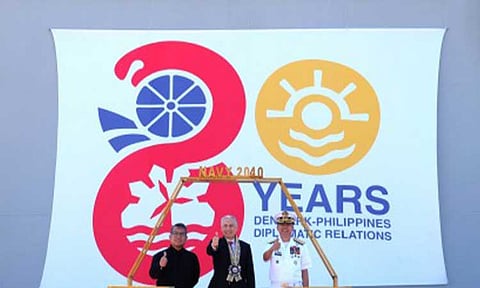 DIPLOMATIC TIES. Department of Foreign Affairs Director for European Affairs Ferdinand Flores, Danish Ambassador Franz-Michael Mellbin and Philippine Navy Rear Admiral Juario Marayag (from left to right) during the unveiling of the commemorative logo for the 80 years of diplomatic relations between Denmark and the Philippines on Tuesday (April 7, 2026) aboard BRP Miguel Malvar at the Naval Operating Base in Subic, Zambales. Officials vowed closer ties that will benefit both countries.(Photo courtesy of the Denmark Embassy in the Philippines)
