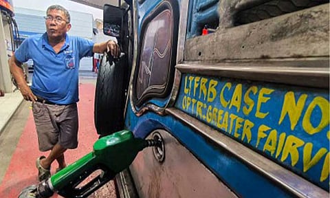 SUBSIDY. Jeepney driver Luisito Estrobilla, who plies the Litex-Commonwealth-Elliptical Road route in Quezon City, avails of the PHP10 per liter discount on April 15, 2026. The government has allotted an initial budget of PHP1.5 billion for the fuel subsidy, which will cover up to 150 liters per week per vehicle until July, benefiting some 142,000 jeepney and UV express units nationwide in partnership with 14,000 gas stations. (PNA photo by Joan Bondoc)