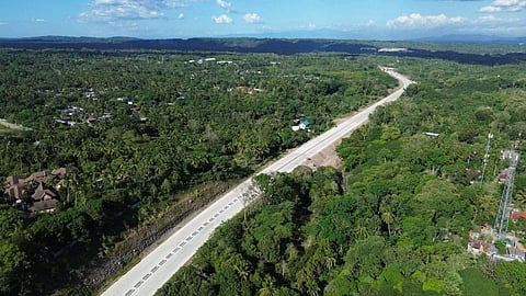 BYPASS PROGRESS. Aerial view shows a segment of the 45.5-kilometer Davao City Bypass Construction Project near Elenita Heights in Catalunan Grande as work advances toward Barangay Mintal. The road network cuts travel time between Barangay Sirawan in Toril, Davao City, and Barangay J.P. Laurel in Panabo City from 1 hour and 44 minutes to 49 minutes. The project includes a 2.3-kilometer mountain twin tunnel, expected to be the country’s longest, and is jointly funded by the Japan International Cooperation Agency and the Philippine government.