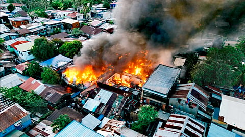 ILOILO. Firefighters and emergency responders battle a residential fire in Barangay Kasing-Kasing, Molo, Iloilo City on April 23, 2026, affecting 23 houses and displacing 93 individuals, with evacuees brought to Baluarte Elementary School.