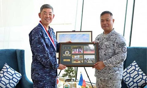 GROWING NAVAL TIES. Philippine Fleet chief Rear Admiral Joe Anthony Orbe of the Philippine Navy presents a memento to Rear Admiral Ikeuchi Izuru, commander of the Amphibious and Mine Warfare Force of the Self-Defense Fleet, Japan Maritime Self-Defense Force (JMSDF), during the latter's April 22, 2026, courtesy call at the Naval Operating Base-Subic in Zambales. The visit showcased the Philippine Navy and JMSDF's growing naval partnership and respect for rules-based international order and the United Nations Convention on the Law of the Sea (UNCLOS). (Photo courtesy of the Philippine Fleet)