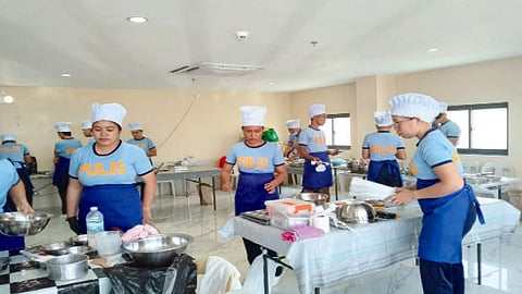 Livelihood program teaches Mandaue cops baking skills