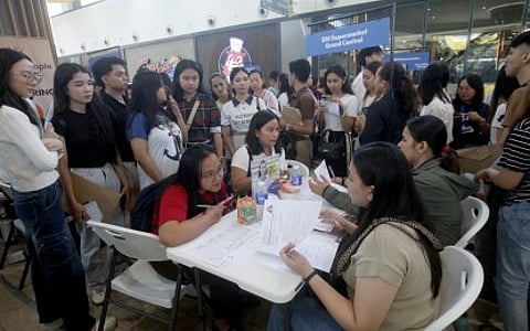 WANTED. Applicants are interviewed on the spot at the Labor Day Job Fair at SM City Grand Central in Caloocan City on Friday (May 1, 2026). The Department of Education said there are dedicated green lanes for Senior High School graduates to accelerate their entry into the workforce. (PNA photo by Yancy Lim)