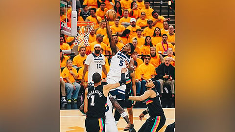 Timberwolves nip Spurs