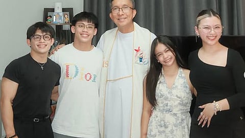 Why were the Yulo parents absent from the house blessing?