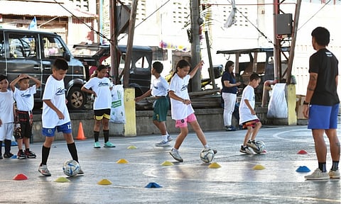 FUTSAL FOR ALL. Young participants sharpen their ball control skills during an Aktibo Dabawenyo futsal clinic organized by the City Sports Development Division as part of its grassroots summer sports program in Davao City. The initiative brings free sports training closer to communities to help develop future Dabawenyo athletes.