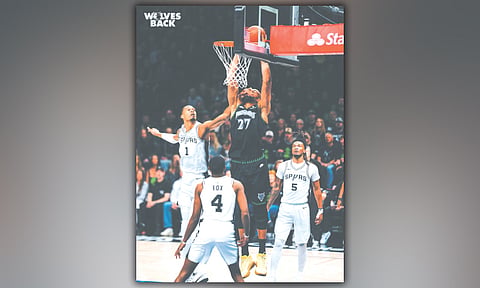 HUNGRY WOLF. Rudy Gobert (No. 27) flies high for a slam over San Antonio’s Victor Wembanyama in Game 4 of the NBA Western Conference semifinals at the Target Center in Minnesota /