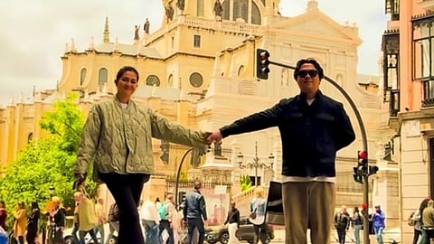 Dimples Romana arrives in Spain with husband