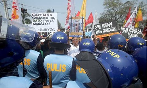 ON ALERT. Multi-sectoral groups gather outside the Senate of the Philippines building in Pasay City on May 13, 2026, calling for the arrest of Senator Ronald dela Rosa and the conviction of Vice President Sara Duterte. The Philippine National Police on Monday (May 18) placed Metro Manila and key regional units on heightened alert ahead of possible protest actions and other activities linked to the opening of Senate impeachment court proceedings against Duterte. (PNA photo by Yancy Lim)
