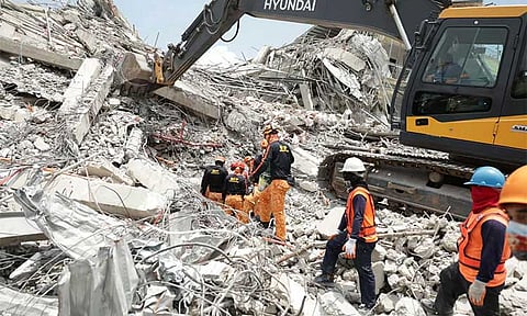 Knocking sounds detected at building collapse site