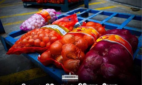 BUSTED. Sacks of red and yellow onions are among smuggled agricultural products seized during an inspection led by the Bureau of Customs (BOC) in a cold storage facility in Nueva Ecija on Monday (June 1, 2026). The BOC said the operation led to the interception of some PHP35.4 million worth of smuggled agricultural products. (Photo courtesy of BOC)