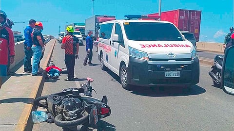 Woman dies after motorcycle-truck collision on Mandaue bridge