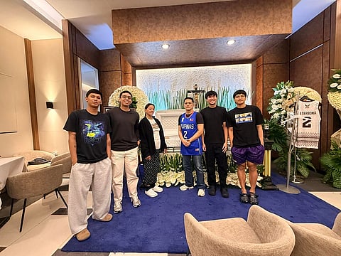 Sen. Robin Padilla wears the Philippine jersey of the late Rene Clert Baterbonia during a visit to his wake at Arlington Memorial Chapels in Quezon City. Also in the photo are Baterbonia’s mother, Rovelyn, and some of his teammates. The jersey was worn when the Davao Region Palarong Pambansa 2025 champion team represented the Philippines at the Asean Schools Games, where they won gold.