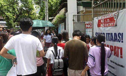 FIRST DAY. Parents and students gather outside the Araullo High School in Manila on Monday (June 8, 2026), the first day of classes for Academic Year 2026-2027. The Philippine National Police on Friday (June 12) urged parents to closely monitor their children’s activities and social circles, after a Grade 7 student was found carrying drug paraphernalia and a knife inside her school in Talisay City, Negros Occidental. (PNA photo by Yancy Lim)