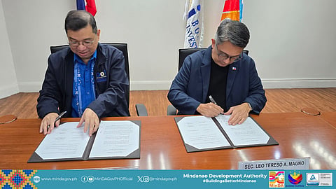 PARTNERSHIP. Board of Investments (BOI) Managing Head Undersecretary Ceferino S. Rodolfo, left, and Mindanao Development Authority (MinDA) Chairperson Secretary Leo Tereso A. Magno (left) and Board of Investments (BOI) Managing Head Undersecretary Ceferino S. Rodolfo sign a memorandum of agreement to strengthen investment promotion and investor facilitation efforts in Mindanao. The partnership aims to attract strategic investments and position the island as a key growth hub for agribusiness, renewable energy, logistics, and tourism.