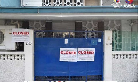 CLOSED. The Department of Migrant Workers padlocks an illegal accommodation facility in Palanan, Makati City on Thursday (June 18, 2026). The DMW also rescued 78 overseas Filipino worker applicants. (Photo courtesy of DMW)
