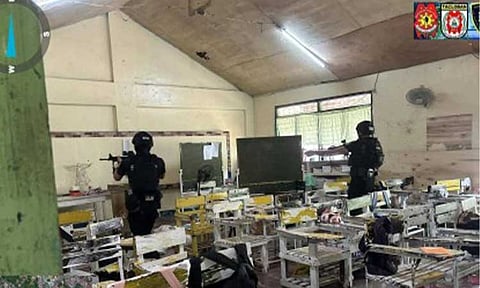 SEARCH. Police search a classroom at San Jose National High School in Tacloban City after a shooting incident Monday (June 22, 2026) morning left three students dead. Authorities arrested two minor suspects. (Photo courtesy of Tacloban City Police Office)