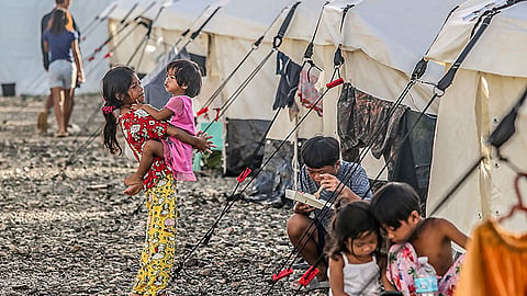 SHELTERED. Almost a month after a magnitude 6.9 earthquake devastated parts of Cebu, displaced families remain in a temporary tent city in Bogo City. Photo captured on October 17, 2026.