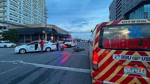 Rider rushed to hospital after taxi collision