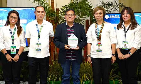 LEADERSHIP EXCELLENCE. Department of Environment and Natural Resources-Davao Region (DENR-Davao) Regional Director Atty. Ma. Mercedes V. Dumagan (fourth from left) and DENR-Davao officials present a Plaque of Appreciation to Davao del Norte Governor Edwin "Kuya Gob" Jubahib (center) on June 25, 2026. The award recognizes Governor Jubahib's leadership in advancing environmental conservation, solid waste management, and the rehabilitation of the Pantaron Mountain Range. Also in the photo are (from left) DENR-Davao officials Maritess Ocampo, Victor Billones, and Maribel Alconera.