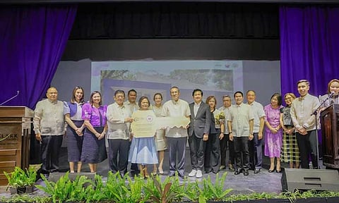 Clark Development Corporation (CDC) President and CEO Atty. Agnes VST Devanadera hands a commemorative key to Chief Justice Alexander Gesmundo of the Supreme Court of the Philippines, marking the establishment of the Supreme Court (SC) Office of the Regional Court Manager (ORCM) Third Judicial Region in Clark. The ceremonial signing, capping the annual Judiciary Month and marking the 125" anniversary of the Philippine Judiciary, was held at Teatro sa Nayon sa Clark on June 30. (CDC Photo)