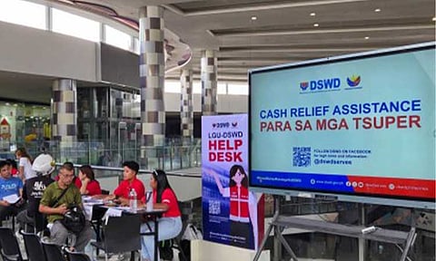 CASH RELIEF FOR DRIVERS. Department of Social Welfare and Development-Negros Island Region personnel distribute PHP5,000 cash relief assistance to transport network vehicle service and delivery service drivers in Negros Occidental at SM City Bacolod on May 28, 2026. The DSWD on Wednesday (July 1, 2026) said it has distributed PHP9.13 billion in cash relief assistance to more than 1.8 million public utility vehicle and delivery drivers nationwide. (Photo courtesy of DSWD)