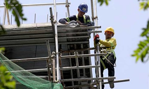 JOBS PUSH. Construction workers carry out their duties at a building site in Ermita, Manila on April 30, 2026. Senator Joel Villanueva on Friday (Aug. 7, 2026) cited the need to accelerate the Trabaho Para sa Bayan plan to create more stable and quality employment after unemployment climbed to 4.9 percent in June. (PNA photo by Yancy Lim)