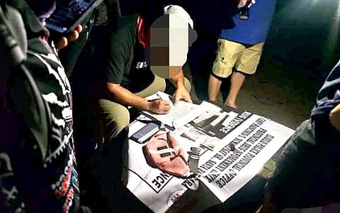 Police operatives seize approximately 215 grams of suspected shabu valued at P1.462 million following a buy-bust operation that resulted in the arrest of two suspected drug personalities in Barangay Batad Viejo, Batad, Iloilo, on August 11, 2026.
