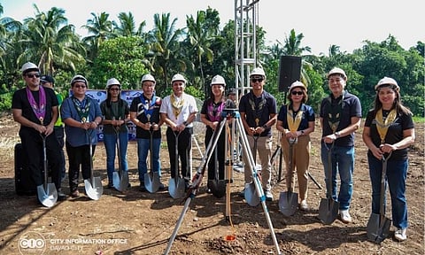 Local officials and private sector partners hold ceremonial shovels during the groundbreaking ceremony for the 630-unit BALAI Calinan Housing Project in Barangay Talomo River, Calinan District. The initiative is a joint public-private partnership between the City Government of Davao, the Department of Human Settlements and Urban Development (DHSUD), BRIA Homes Inc., and Vista Land Lifescapes Inc. to provide socialized transitory rental housing for underprivileged families.