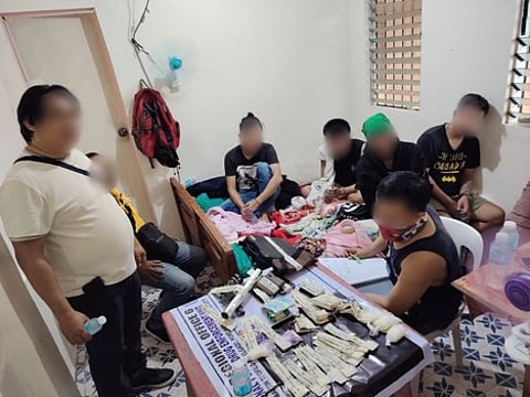 Police operatives document suspected shabu and other evidence recovered during separate anti-illegal drug operations in Mambusao and Panitan, Capiz, on August 14, 2026. About 500 grams of suspected shabu worth P3.4 million were seized, four high-value individuals were arrested, and a caliber .38 revolver with six live rounds was recovered. Another regional priority drug target remained at large.