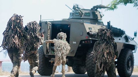 ZAMBOANGA. Troops rush to board an Armored Personnel Carrier during the Inter-Agency Coastal Defense Operations exercise on Wednesday, August 19, at Allayon Port in Luuk, Sulu, showcasing how various government agencies and local stakeholders can integrate their respective capabilities under a unified command-and-control structure to detect, respond to, and address potential threats approaching from the sea. (SunStar Zamboanga)