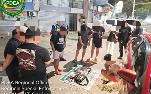 RIDER NABBED. A 22-year-old courier is arrested in a buy-bust operation in Mabalacat City, Pampanga on Friday (Aug. 21, 2206). Authorities seized approximately 500 grams of suspected shabu with an estimated street value of PHP3.4 million. (Photo from PDEA-3)