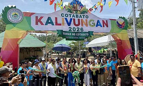 tabato Governor Emmylou "Lala" Taliño-Mendoza (center) leads local officials in a ribbon-cutting ceremony to officially open the Kalivungan Festival 2026 and the Yaman ng Cotabato Travel and Trade Expo at The Basket inside the Capitol Compound. The event marks the 112th Founding Anniversary of the province, showcasing local crops and products from its 17 municipalities and lone city through September 1.
