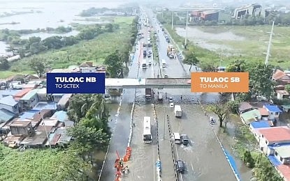 GRIDLOCK. The North Luzon Expressway reports heavy traffic in San Simon, Pampanga, as of 11 a.m. Tuesday (Sept. 1, 2026) due to water buildup. Malacañang said the government is not currently considering sanctions against NLEX management over the prolonged stranding of motorists caused by flooding, as immediate relief for affected travelers remains the priority. (NLEX screengrab)