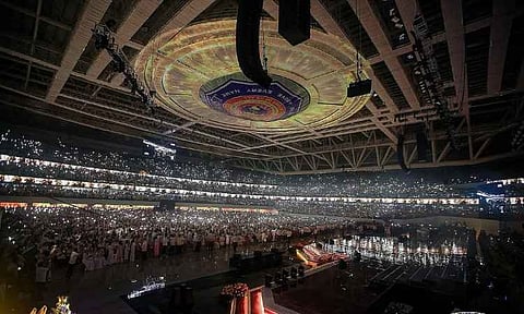 A massive crowd fills the 75,000-seat Kingdom of Jesus Christ (KOJC) Kingdome during its grand opening ceremony and the religious group's 41st anniversary celebration in Davao City. The multi-billion peso indoor arena, touted as one of the world's largest, formally opened its doors to worshippers and guests following 14 years of construction.