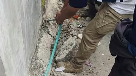 ZAMBOANGA. Members of the Energy Recovery Team of the Zamboanga City Electric Cooperative uncover an illegal electric connection concealed in a water hose during an anti-pilferage operation on Wednesday, September 2, 2026, in Campo Islam village, Zamboanga City. (SunStar Zamboanga)