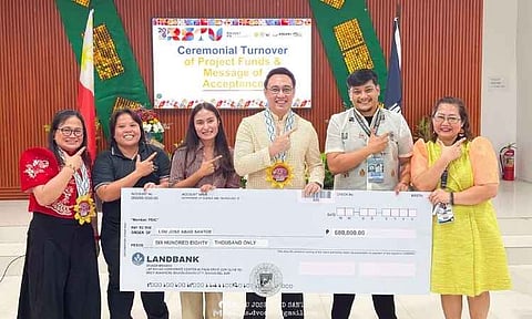 Officials from the Department of Science and Technology (DOST) XI and the Local Government Unit of Jose Abad Santos display a ceremonial check worth ₱680,000.00 during the turnover of project funds for the SMARTBUNOT initiative. The grant aims to convert discarded coconut husks into value-added products, boosting local livelihood opportunities and enhancing the municipality's disaster resilience efforts.