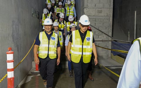 RAIL INSPECTION. Senator Joseph Victor "JV" Ejercito and Department of Transportation (DOTr) acting Secretary Banoy Lopez led an inspection of a North-South Commuter Railway construction site in Quezon City, along with other government executives and project partners, on Thursday (Sept. 17, 2026). The Senate has assured continued funding for big-ticket railway projects as Ejercito and Lopez inspected ongoing construction. (Photo courtesy of DOTr)