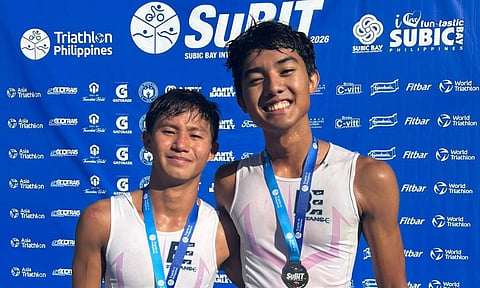 RACE PARTNERS. Earl Ting, left, and Joshua Cabusas pose after finishing first and third, respectively, in the recent SUBIT 2026 Sprint Age Group competition. Ting will compete in the Filipino Elite field at the Damosa Land 5150 on Sept. 20 in Samal Island, Davao del Norte.