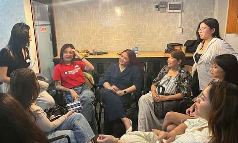 SHARING STORIES. Women entrepreneurs and business leaders take part in a discussion during WE Meet Davao, exchanging experiences and insights on the challenges of starting and sustaining businesses.
